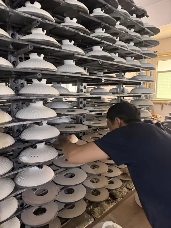 Glazed lids placed on racks.